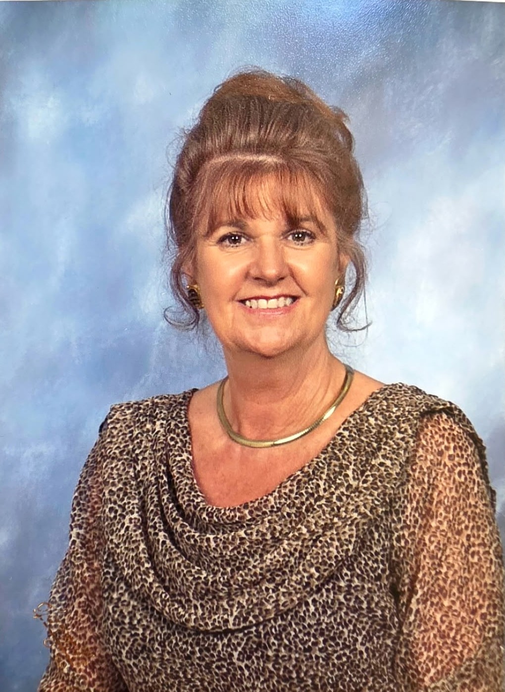 Norma Jane Morrison smiling in a formal portrait